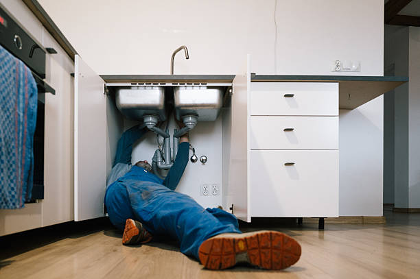 Professional Drain Cleaning technician working in Peconic, NY